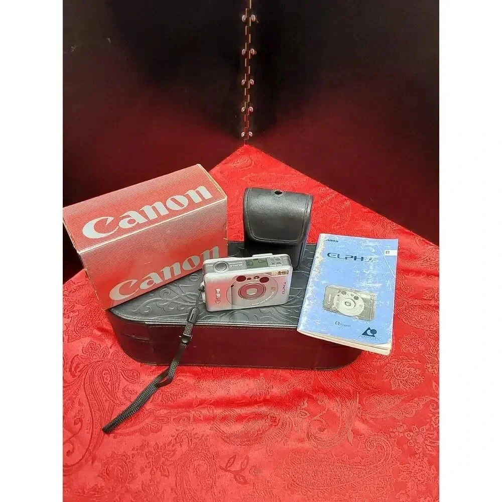 Camera by Canon model lX240 ELPH JR. Includes soft case working Film Camera